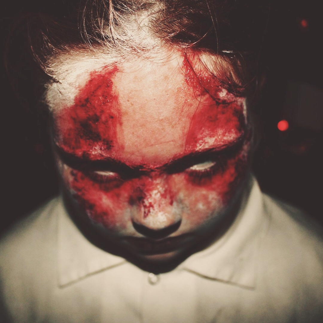 bloodied face